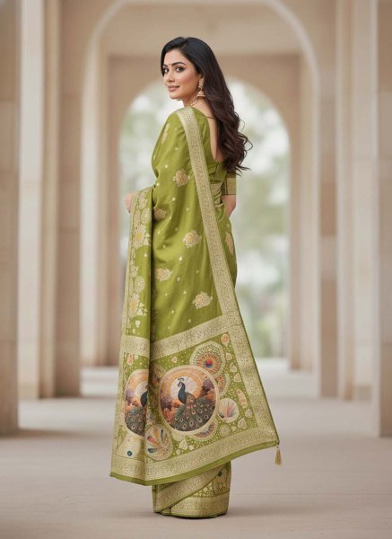 Elegant Bottle Green Dola Silk Saree with Traditional Zari Woven Peacock Pallu   Latkans Silk Sarees